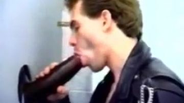 Guy enjoying sucking of big black cock from gloryhole